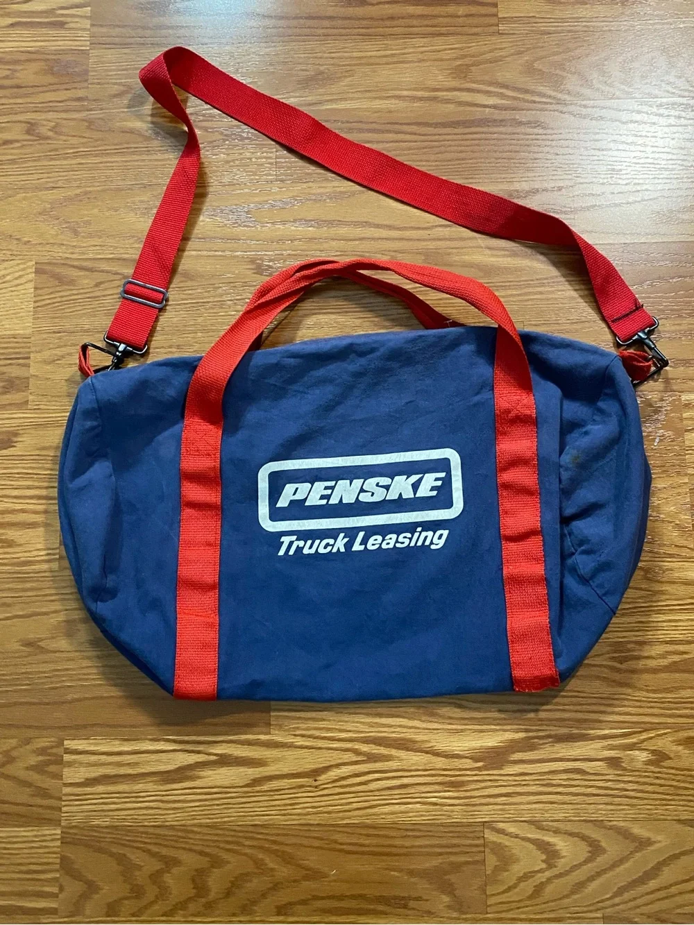 Vintage NFL Navy Duffel Bag with Red Straps and Logo